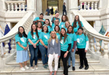 Tides Family Services STATE LEVEL: Tides Family Services staff members gather at the R.I. Statehouse.
COURTESY TIDES FAMILY SERVICES