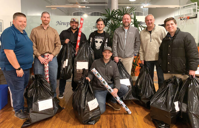 ALL WRAPPED UP: Envision Technology Advisors LLC employees take part in charity gift wrapping for the 2023 holiday season.
COURTESY ENVISION TECHNOLOGY ADVISORS LLC ALL WRAPPED UP: Envision Technology Advisors LLC employees take part in charity gift wrapping for the 2023 holiday season.
COURTESY ENVISION TECHNOLOGY ADVISORS LLC