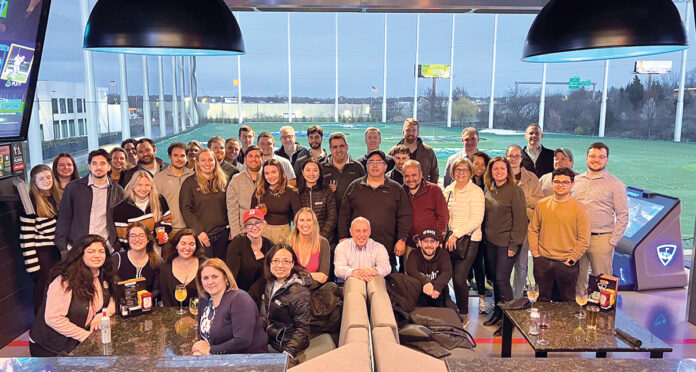 GOLF OUTING: Employees at Marcum LLP gather for a recent company outing at Topgolf Rhode Island in Cranston.
COURTESY MARCUM LLP GOLF OUTING: Employees at Marcum LLP gather for a recent company outing at Topgolf Rhode Island in Cranston.
COURTESY MARCUM LLP