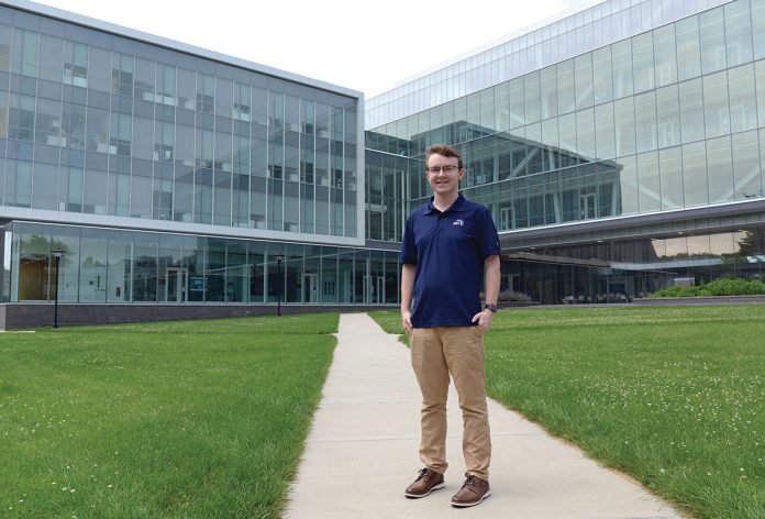 FULL OF ENERGY: University of Rhode Island engineering student Casey Egan is interning with the utility company PPL Corp. and is hopeful the partnership between PPL and URI will give researchers a chance to contribute to the fight against climate change.  PBN PHOTO/­ELIZABETH GRAHAM