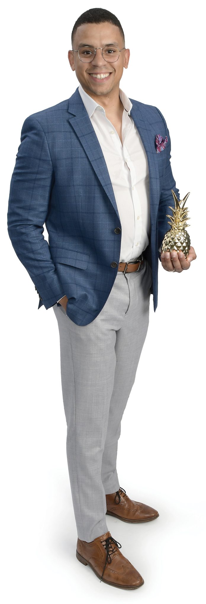 the prop
Arnaldo Almonte holds a brass-plated pineapple, the symbol of hospitality. the prop
Arnaldo Almonte holds a brass-plated pineapple, the symbol of hospitality.