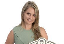 Melissa Bouchard the prop
Melissa Bouchard holds a sign from her office with the phrase “The She-Shed.” “The prop is a fun reminder of how far Fusion3 has come since we first started in 2019 … and who doesn’t want a she-shed?” Bouchard said.