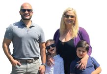 Daniel Pereira the prop
Daniel Pereira poses with his wife, Kristen, and their two children, Elliott, 6, and Wyatt, 5.