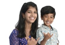 Sarnya Kunchithapatham Pichaiyappa the prop
Sarnya Kunchithapatham Pichaiyappa
wears a traditional Indian saree, which reminds her of her identity and roots, and poses with her son, Dharma, 3.