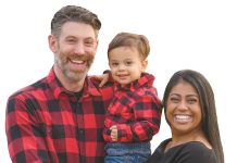 the prop  Dr. Nadine Hewamudalige poses with her son, Ezio, and husband, Matt.