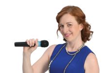 Michelle Pelletier the prop
Michelle Pelletier holds a microphone, which she uses to
sing, and loves “shouting” about her company and brand.