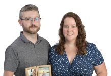 Kaleigh Perkins the prop
Kaleigh Perkins poses with her fiancé, Eric, pictures of her two children, Sylas and Wyatt, and her clinical social worker license.
