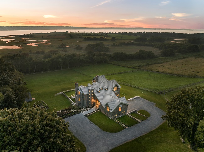 A CASTLE-LIKE HOME that was custom-built at 82 Nonquit Lane on nearly 3 acres of land in Tiverton recently sold for $5.3 million, making it the highest-ever residential property sale in town history. / COURTESY COMPASS INC.