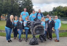 CLEANING CREW: AAA Northeast staffers, bottom from left, Christine Kiernan, Sue Fice, Sarah Palmer, Shannon Hayle, Devon Chace, Chelsie McMann and Mike Alsfeld; top from left, Peter Smith, Christina Saillant, Ron Arigo and Zach Lit, volunteer for a recent Save the Bay Inc. cleanup event. COURTESY AAA NORTHEAST