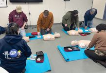 Pinning down new ways to feel fit at Groov-Pin HANDS-ON LEARNING:
Groov-Pin Corp. employees take a CPR class to learn the lifesaving measure.
COURTESY GROOV-PIN CORP.