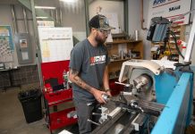 TECH TRANSFORMATION: AI finding its place in evolving industry LATHE LESSON: Trainee Trevor Harmon operates a lathe machine in the Manufacturing Lab at the New England Institute of Technology.
PBN PHOTO/PAUL J. SPETRINI