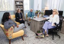 Newport Mental Health improving the quality of care A BETTER MINDSET: From left, Francheska Calderon, human resources business partner; Susan Piacenti, vice president of philanthropy; Dr. Richard Whalen, medical director; and Dayna Gladstein, CEO and president, have a conversation at Newport Mental Health’s offices in Middletown.
PBN PHOTO/TRACY JENKINS