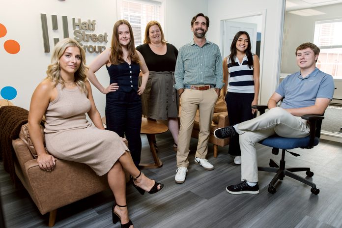 GROUP PROJECT: From left, Half Street Group account executives Chelsea DeCesare and Elisabeth Wales, Account Director Hillary Lima, founder and President Mike Raia, digital and social media specialist Nadia Engenheiro, and summer intern and Events Coordinator Jackson Duffy work to cultivate and
manage clients’ reputations by providing relief in crisis communication settings.
PBN PHOTO/RUPERT WHITELEY GROUP PROJECT: From left, Half Street Group account executives Chelsea DeCesare and Elisabeth Wales, Account Director Hillary Lima, founder and President Mike Raia, digital and social media specialist Nadia Engenheiro, and summer intern and Events Coordinator Jackson Duffy work to cultivate and
manage clients’ reputations by providing relief in crisis communication settings.
PBN PHOTO/RUPERT WHITELEY