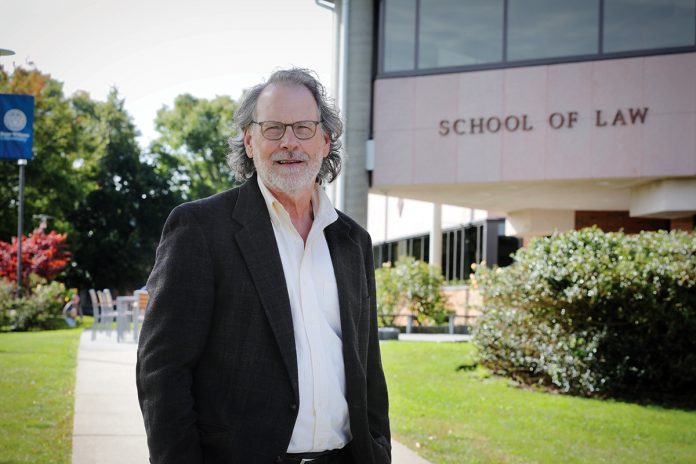LEGAL ­MATTERS: ­Michael J. ­Yelnosky, professor at the Roger Williams University School of Law, says a lawsuit filed by a California attorney and his wife against the social equity provisions of the Rhode Island Cannabis Act has a chance of throwing a monkey wrench into the licensing process.  PBN PHOTO/­ARTISTIC IMAGES
