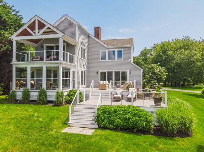 AFTER REDESIGN and renovation, a contemporary home on the coast of Jamestown at 25 Fly Jib Court recently sold for $3.9 million. / COURTESY COMPASS INC.