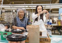Diversification plus strong corporate culture equals success for Tanury COMMON THREAD: From left, Tanury Industries employees Marcella Viczcaino and Beatrice Ramirez connect threads to piece together jewelry at the company’s Lincoln facility.
PBN PHOTO / TRACY JENKINS