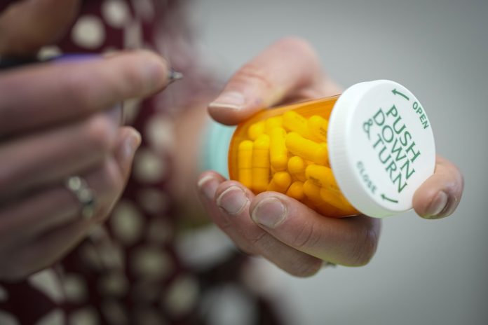 PHARMACY BENEFIT MANAGERS such as CVS Caremark, which is owned by CVS Health Corp, are being accused to wielding enormous power over prescription drug prices. / AP FILE PHOTO/CHRIS CARLSON