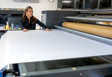 Meet the Makers: Warwick poker table maker has played its cards just right ATTENTION TO DETAIL: Gorilla Gaming co-owner Gretel McCrory works on the factory floor at the Warwick gaming table manufacturer. The company’s attention to detail has caught the eye of big players in the gambling industry, including signing a deal in 2017 to be the official poker table of the World Series of Poker
PBN PHOTO/MICHAEL SALERNO