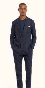 IT FITS IN: A curated work wardrobe ensures you’re prepared for any professional setting. This double-breasted suit is silk, linen and cashmere, and the T-shirt is a silk and cotton crew neck.  COURTESY  MARC A. STREISAND