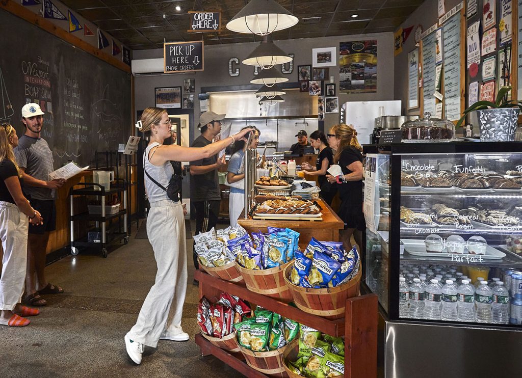 OCEAN STATE TIES: Customers wait to order items at CRU Cafe Newport, which is owned and operated by Russell Morin Catering & Events, a long-running, family-owned hospitality business based in Attleboro.
COURTESY MORIN RESTAURANT GROUP