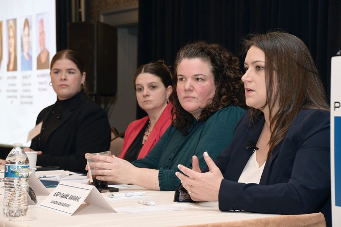 TOUGH TIME: Katharine Amaral, right, director of programs and community partnerships for the nonprofit Junior Achievement of Rhode Island Inc., speaks during Providence Business News’ 2025 Workforce Development Summit on Feb. 13. With her on the panel, from left, are Ara Millette, director of talent acquisition at Brown University Health; Amy Grzybowski, New England Institute of Technology vice president of workforce development and community relations; and Nora Crowley, R.I. Department of Labor and Training deputy director.  PBN PHOTO/MIKE SKORSKI