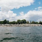 THE R.I. COASTAL Resources Management Council voted unanimously in January to deny the Quidnessett Country Club’s attempt to keep its illegal seawall, but that popular decision did little to quell calls for the CRMC to be abolished. / COURTESY SAVE THE BAY STAFF VIA THE RHODE ISLAND CURRENT