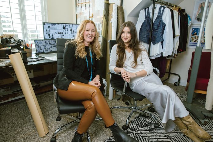 REGIONAL FOCUS: Elizabeth Hulting, left, founder and president of hospitality apparel company KAPTVA Apparel LLC in West Greenwich, and her daughter, Alysha Hulting, designer and artistic director, have been providing uniforms for big-name clients across the casino and fine dining industries in Las Vegas and New York since 2019, but now the company is turning its attention to growing its New England client base. PBN PHOTO/RUPERT WHITELEY
