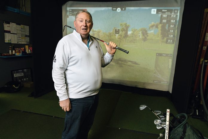 MAKE IT FAST: Peter Walsh, owner of indoor golf facility Golf365RI LLC, says the trend toward golfers wanting to play shorter rounds has helped spur the design of much smaller golf courses in recent years.  PBN PHOTO/RUPERT WHITELEY