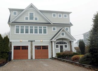FIRST OF A KIND: Ten years ago, this South Kingstown house on Teal Drive was the first in Rhode Island to be constructed to the Fortified building standard developed by the Insurance Institute for Business & Home Safety in 2010. There are bills in the state Senate and House to make funding available for more homes to be “hardened” against extreme weather.  PBN PHOTO/ELIZABETH GRAHAM