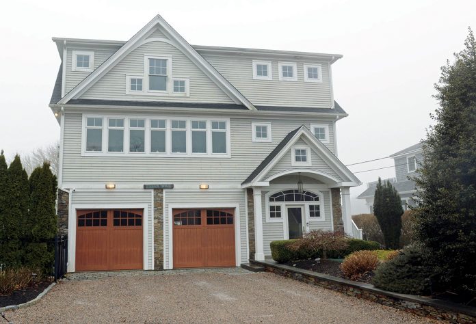 FIRST OF A KIND: Ten years ago, this South Kingstown house on Teal Drive was the first in Rhode Island to be constructed to the Fortified building standard developed by the Insurance Institute for Business & Home Safety in 2010. There are bills in the state Senate and House to make funding available for more homes to be “hardened” against extreme weather.  PBN PHOTO/ELIZABETH GRAHAM