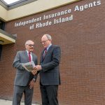 CHALLENGING MARKET: Butler & Messier Inc. insurance agent Ernie Shaghalian, left, chairman of the Government Affairs Committee of the Independent Insurance Agents of Rhode Island, meets with Mark Male, CEO and president of Rhode Island Association of Insurance Agents Inc. Shaghalian says the property insurance market is the worst he’s seen it in 45 years. PBN PHOTO/MICHAEL SALERNO
