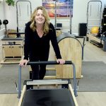 MAKING A DIFFERENCE: CBX Pilates owner Deborah McElkenny in her Charlestown studio. PBN PHOTO/ELIZABETH GRAHAM