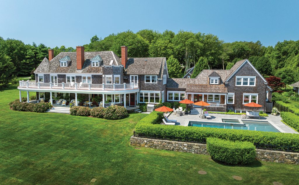 SHINING EXAMPLE: The shingle-style house known as Fowler’s Rocks in Jamestown, which includes a sweeping 6-acre yard on the east shoreline of the island, was the highest-priced house sale in Rhode Island in 2024 at $12.25 million.  COURTESY COMPASS INC.