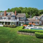 SHINING EXAMPLE: The shingle-style house known as Fowler’s Rocks in Jamestown, which includes a sweeping 6-acre yard on the east shoreline of the island, was the highest-priced house sale in Rhode Island in 2024 at $12.25 million.  COURTESY COMPASS INC.  