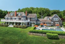 SHINING EXAMPLE: The shingle-style house known as Fowler’s Rocks in Jamestown, which includes a sweeping 6-acre yard on the east shoreline of the island, was the highest-priced house sale in Rhode Island in 2024 at $12.25 million.  COURTESY COMPASS INC.  