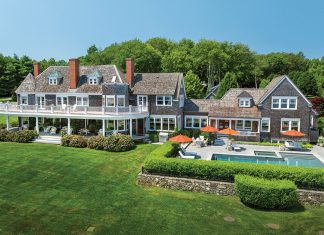 SHINING EXAMPLE: The shingle-style house known as Fowler’s Rocks in Jamestown, which includes a sweeping 6-acre yard on the east shoreline of the island, was the highest-priced house sale in Rhode Island in 2024 at $12.25 million.  COURTESY COMPASS INC.  