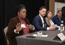 IN PROGRESS: Michelle A. Reddish, left, administrator at the R.I. Cannabis Control Commission, talks about the commission’s process of putting a licensing system in place for recreational marijuana sales. She is one of four panelists at the Providence Business News’ 2025 Business of Cannabis Summit in Providence on March 6. Also on the panel are, from left, Benjamin L. Rackliffe, partner of Pannone Lopes Devereaux & O’Gara LLC; Sasha Gorski, co-owner of Talaria LLC; and Ronald Crosson II, executive director of Urban Ventures Inc. and chairman and social equity officer of the R.I. Cannabis Advisory Board.  PBN PHOTO/MIKE SKORSKI