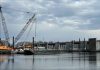 OFFICIALS ARE investigating an accidental leak that dispensed hydraulic fluid into the Seekonk River just north of the Washington Bridge, according to WPRI-TV CBS 12. / PBN PHOTO/WILLIAM HAMILTON