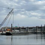 OFFICIALS ARE investigating an accidental leak that dispensed hydraulic fluid into the Seekonk River just north of the Washington Bridge, according to WPRI-TV CBS 12. / PBN PHOTO/WILLIAM HAMILTON