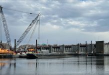 OFFICIALS ARE investigating an accidental leak that dispensed hydraulic fluid into the Seekonk River just north of the Washington Bridge, according to WPRI-TV CBS 12. / PBN PHOTO/WILLIAM HAMILTON