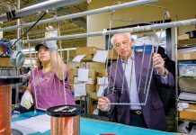 CONSTANT DIVERSIFICATION: Evelyn Gutierrez works on countertop rails for an American-made yacht with Chairman Thomas Tanury at Lincoln-based metal finishing company Tanury Industries. The company used to specialize in jewelry, but now the largest markets it serves are lighting, electronics, aerospace and giftware. PBN PHOTO/MICHAEL SALERNO