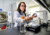 PLANT PROGNOSIS: Keiddy Urrea-Morawicki, director of the Plant Diagnostic Laboratory at the University of Rhode Island in South Kingstown, works in the lab. PBN PHOTO/MICHAEL SALERNO