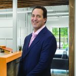 TECH SAVVY: Pariseault Builders Inc. Chief Operating Officer Chris Integlia has led multiple efforts at the company to integrate digital tools and technologies into project delivery, communication and resource allocation.  PBN PHOTO/PAMELA BHATIA