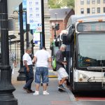 PASSENGERS GET ON a R.I. Public Transit Authority bus at Kennedy Plaza in Providence. / PBN FILE PHOTO/ELIZABETH GRAHAM