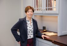 TROUBLESHOOTER: Fall River Five Cents Savings Bank Senior Vice President and Chief Information Officer Maureen Terranova says she has to remain open-minded to keep up with various changes and to fulfill her goal of supporting the business’s needs.  PBN PHOTO/TRACY JENKINS
