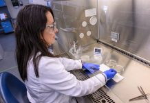PLANT PROGNOSIS: Keiddy Urrea-Morawicki, director of the Plant Diagnostic Laboratory at the University of Rhode Island in South Kingstown, works in the lab. PBN PHOTO/MICHAEL SALERNO
