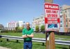 OPPOSED: Randall Rose, a member of the Kennedy Plaza Resilience Coalition, is pictured in front of one of the parcels next to the train station recommended for a new R.I. Public Transit Authority hub. PBN PHOTO/PAUL J. SPETRINI