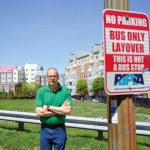 OPPOSED: Randall Rose, a member of the Kennedy Plaza Resilience Coalition, is pictured in front of one of the parcels next to the train station recommended for a new R.I. Public Transit Authority hub. PBN PHOTO/PAUL J. SPETRINI