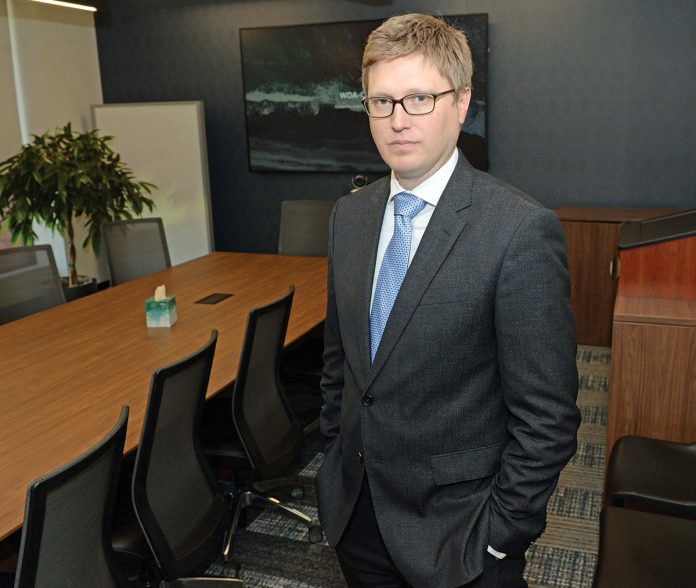 A SIMPLER SYSTEM? Attorney Zachary Stolz, a law partner at Chisholm Chisholm & Kilpatrick Ltd.  who works on veterans affairs, is hopeful that the Dole Act, signed into law in January, will streamline the disability benefit process.  PBN PHOTO/ELIZABETH GRAHAM