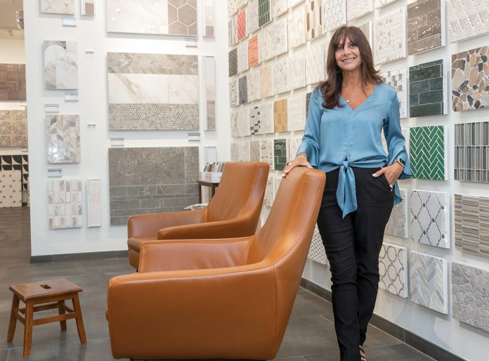 STYLE GUIDE: Interior designer Linda Greco of Linlocks Finds and Designs visits the showroom at Dal-Tile Services Inc. in Warwick, where she often gets materials for remodeling projects.  PBN FILE PHOTO/MICHAEL SALERNO